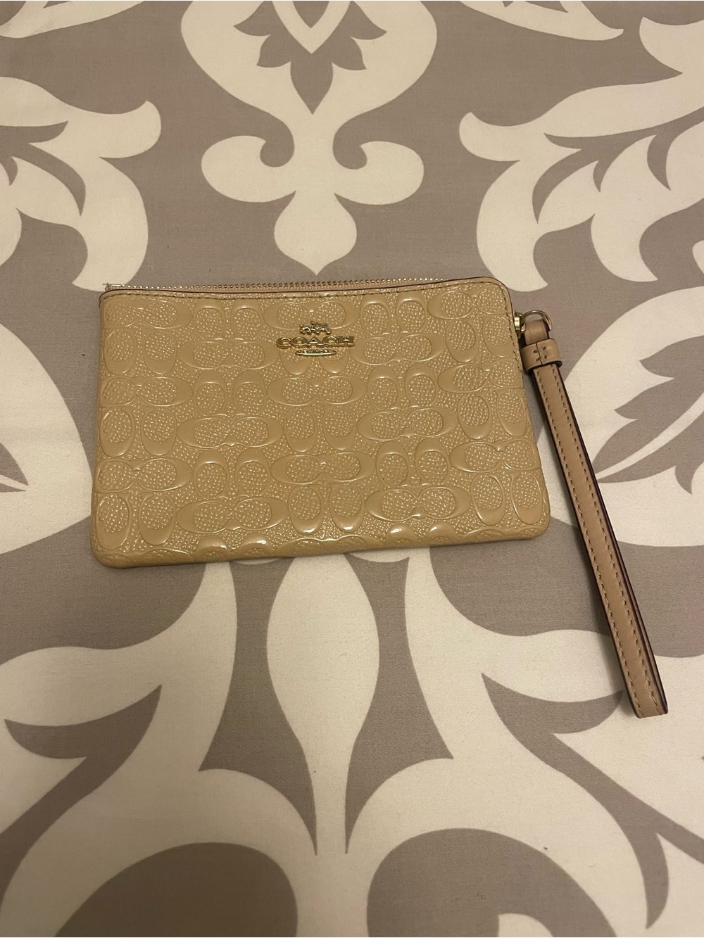 Coach Patent Leather Wristlet in Light Beige